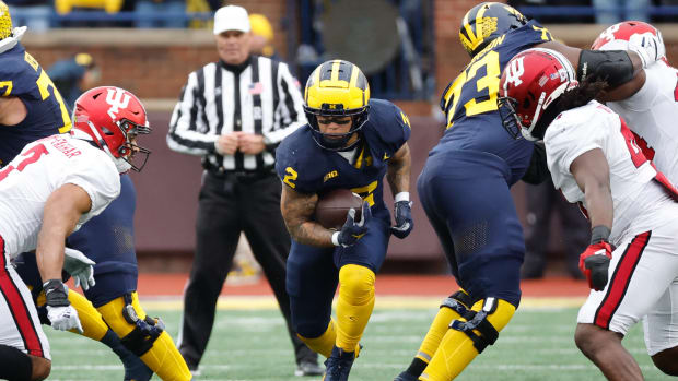 Oct 14, 2023; Ann Arbor, Michigan, USA; Michigan Wolverines running back Blake Corum (2) rushes in the first half against the Indiana Hoosiers at Michigan Stadium. Mandatory Credit: Rick Osentoski-USA TODAY Sports  